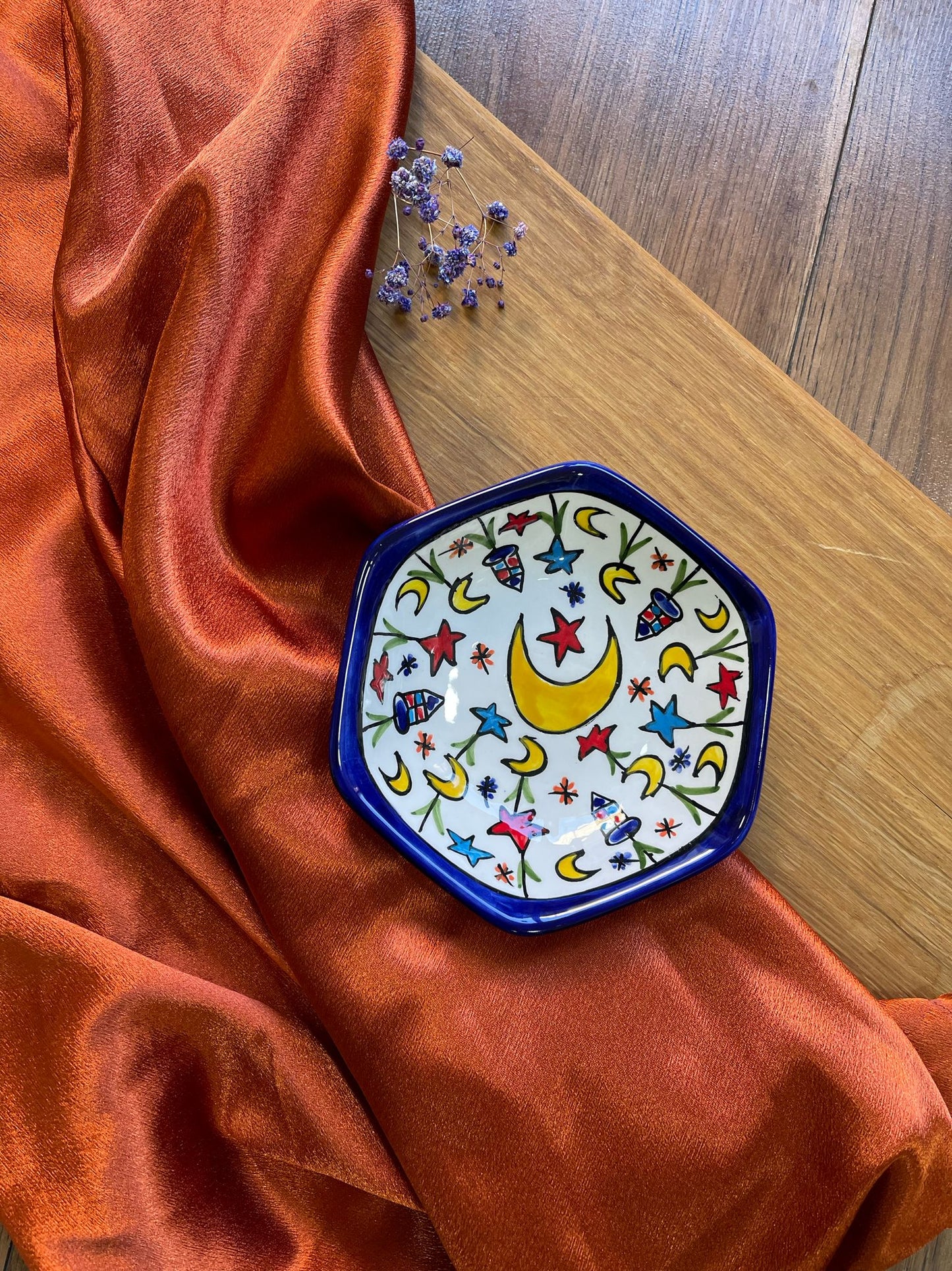 A handcrafted ceramic hexagonal plate