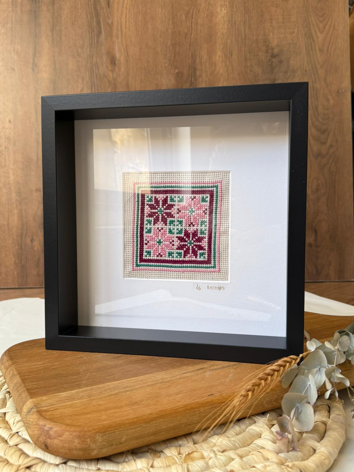 handcrafted embroidery artwork beautifully presented in a frame