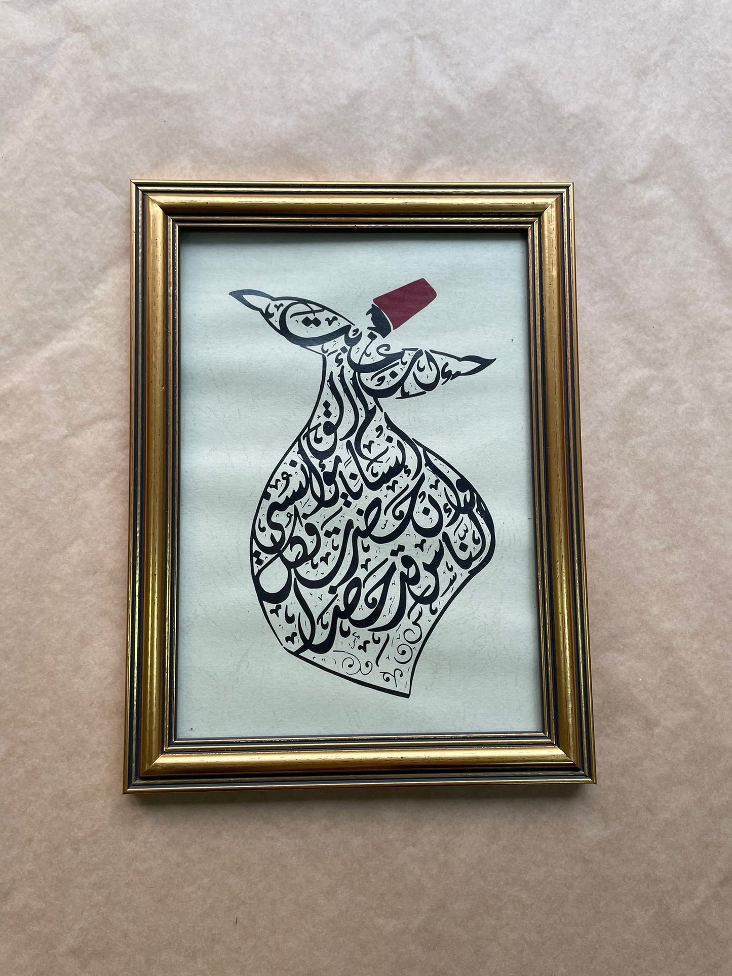 Arabic Calligraphy  : If she was absent, I feel like i have no one to comfort me, and if she was present, i fell like the whole world is here ان غابت لم القى انسانا يؤنسني وان حضرت فكل الناس قد حضر