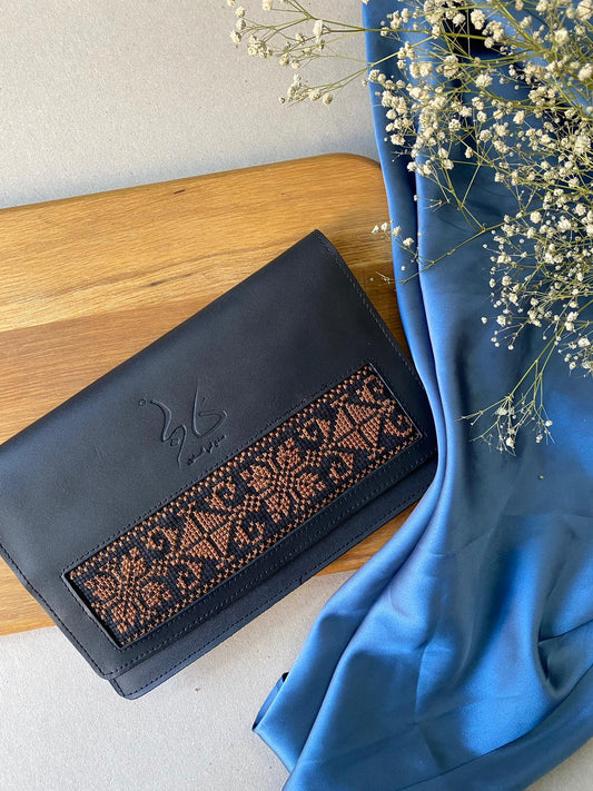 "Benti Tasneem" Leather Clutch