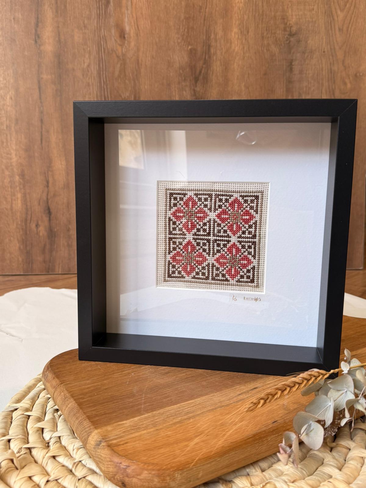 handcrafted embroidery artwork beautifully presented in a frame